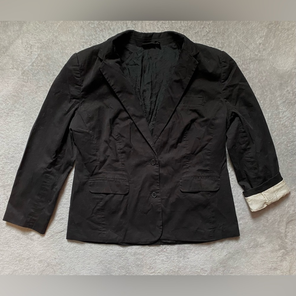 Black button down blazer with shoulder pads